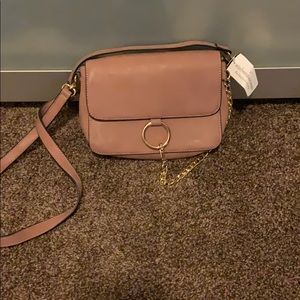 Brand new Crossbody bag in dusty rose color.